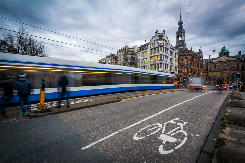Traffic on Raadhuisstraat, in Amsterdam, The Netherlands. District Heating Comsof